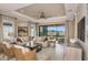 Living room with sliding glass doors leading to the backyard at 29555 Zupetta Ln, Wesley Chapel, FL 33545