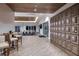 Community wine room with storage lockers and lounge at 29555 Zupetta Ln, Wesley Chapel, FL 33545