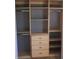 Custom closet with adjustable shelves, hanging rods, and drawers at 3083 55Th N Ave, St Petersburg, FL 33714