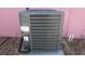 HVAC unit on a concrete slab near the exterior wall at 3083 55Th N Ave, St Petersburg, FL 33714