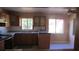 A kitchen with tan colored walls and cabinets at 3083 55Th N Ave, St Petersburg, FL 33714