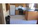 This kitchen features laminate countertops, white appliances, and plenty of cabinet space at 3083 55Th N Ave, St Petersburg, FL 33714