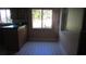 A sunny kitchen with a black and white tile floor at 3083 55Th N Ave, St Petersburg, FL 33714