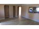 Bright living room featuring hardwood floors, neutral walls, and an open layout at 3083 55Th N Ave, St Petersburg, FL 33714
