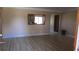 Inviting living room featuring hardwood floors, neutral walls, and an open layout at 3083 55Th N Ave, St Petersburg, FL 33714