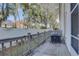 Private backyard with wooden deck and fenced area at 3145 Meta Ct, Largo, FL 33771