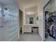 Main bathroom with walk-in shower, vanity, and closet at 3145 Meta Ct, Largo, FL 33771