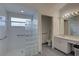 Main bathroom with walk-in shower and grab bars at 3145 Meta Ct, Largo, FL 33771