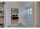 Bathroom with shower, bedroom access, and walk-in closet at 3145 Meta Ct, Largo, FL 33771