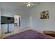 Spacious bedroom with large TV, en-suite bathroom access at 3145 Meta Ct, Largo, FL 33771