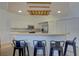Modern kitchen with stainless steel appliances and breakfast bar at 3145 Meta Ct, Largo, FL 33771