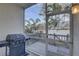Screened patio with gas grill and backyard access at 3145 Meta Ct, Largo, FL 33771