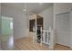 Upstairs hallway with access to bedrooms and a home elevator at 3145 Meta Ct, Largo, FL 33771