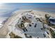 An aerial view of a sandy beach area with parking, and colorful shaded picnic areas at 3476 Tidewater Dr, Weeki Wachee, FL 34607