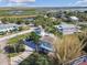 An aerial view showcasing the home and surrounding waterfront community, highlighting the area's marshy landscape at 3476 Tidewater Dr, Weeki Wachee, FL 34607