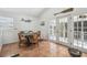 Bright dining area featuring tile floors and access to the outdoors at 3476 Tidewater Dr, Weeki Wachee, FL 34607