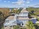 Beautiful coastal home with a unique tower feature and multiple decks, offering stunning views at 3476 Tidewater Dr, Weeki Wachee, FL 34607