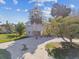 This elevated home offers an observation tower, paver driveway, and lush landscaping at 3476 Tidewater Dr, Weeki Wachee, FL 34607