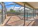 Spacious pool and patio area with screened enclosure at 3500 Landmark Trl, Palm Harbor, FL 34684