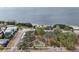 Aerial view showing park, waterfront, and surrounding streets at 363 Sanctuary Dr, Crystal Beach, FL 34681