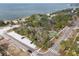 Wide aerial view of waterfront property and neighborhood at 363 Sanctuary Dr, Crystal Beach, FL 34681