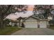 Two-story home with attached two-car garage at 363 Sanctuary Dr, Crystal Beach, FL 34681