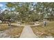 Quaint park scene with benches and gazebo at 363 Sanctuary Dr, Crystal Beach, FL 34681