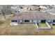 Aerial view showing a community of homes with private yards at 37804 Prairie Rose Loop, Zephyrhills, FL 33542