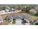 Three-unit building with attached garages and ample parking at 37804 Prairie Rose Loop, Zephyrhills, FL 33542