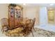 Dining area with hutch and round table, great for entertaining at 37804 Prairie Rose Loop, Zephyrhills, FL 33542