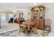 Cozy dining area with wood table and chairs, perfect for Gathering meals at 37804 Prairie Rose Loop, Zephyrhills, FL 33542