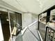 Private balcony with sliding glass doors and exterior access at 4511 S Oak Dr # R12, Tampa, FL 33611
