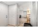 Hallway with tile floors leading to the living areas and bedrooms at 455 Alt 19 S # 268, Palm Harbor, FL 34683
