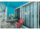 Cozy patio with seating, perfect for relaxing and enjoying the outdoor view at 455 Alt 19 S # 268, Palm Harbor, FL 34683