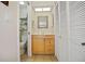 Light and airy bathroom with a toilet, sink, and shower at 460 Paula S Dr # 401, Dunedin, FL 34698