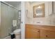 Clean bathroom with updated vanity, toilet, and shower at 460 Paula S Dr # 401, Dunedin, FL 34698