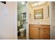 Clean bathroom with updated vanity, toilet, and shower at 460 Paula S Dr # 401, Dunedin, FL 34698