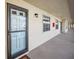 Building exterior showcasing the entrance and hallway at 460 Paula S Dr # 401, Dunedin, FL 34698