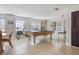 Community game room with pool table and ping pong at 460 Paula S Dr # 401, Dunedin, FL 34698