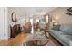 Living room with comfortable seating and wood floors at 460 Paula S Dr # 401, Dunedin, FL 34698