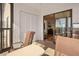 Spacious screened porch with table and chairs, great for relaxing at 460 Paula S Dr # 401, Dunedin, FL 34698