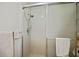 Clean shower stall with tiled walls and glass door at 460 Paula S Dr # 401, Dunedin, FL 34698