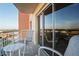 Relaxing balcony with patio furniture and water views at 4900 Brittany S Dr # 909, St Petersburg, FL 33715