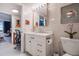 Modern bathroom with white vanity and a walk-in shower at 4900 Brittany S Dr # 909, St Petersburg, FL 33715