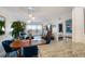 Dining area with a mid-century modern table and chairs at 4900 Brittany S Dr # 909, St Petersburg, FL 33715