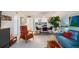 Living room with mid-century modern furniture and open floor plan at 4900 Brittany S Dr # 909, St Petersburg, FL 33715