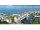 Aerial view of the condo complex and community amenities including waterfront views and a swimming pool at 5155 S Isla Key S Blvd # 202, St Petersburg, FL 33715