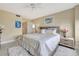 Bright bedroom with a king-size bed and an ensuite bathroom at 5155 S Isla Key S Blvd # 202, St Petersburg, FL 33715