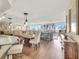 Open concept dining area with ocean views and a modern aesthetic at 5155 S Isla Key S Blvd # 202, St Petersburg, FL 33715