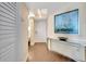 Light and airy condo entry with wood-look floors at 5155 S Isla Key S Blvd # 202, St Petersburg, FL 33715